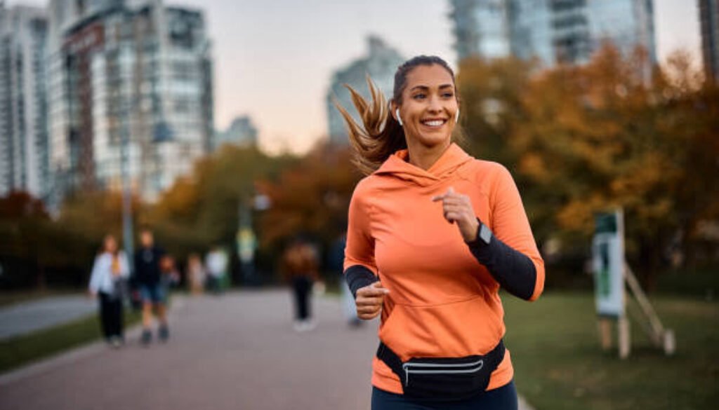 a women runniing and smilling