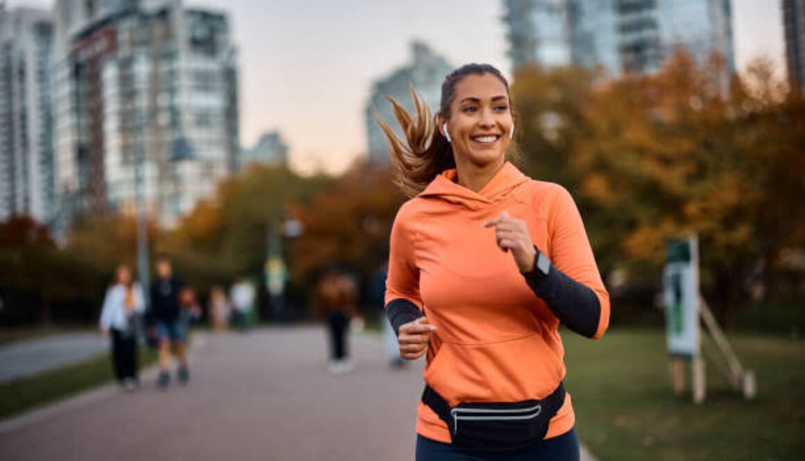 a women runniing and smilling