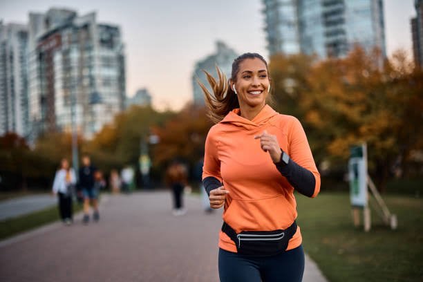 a women runniing and smilling